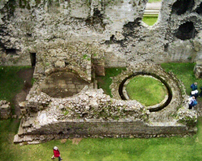 Remains of a large oven (left) and a 16th century horse mill (right)
